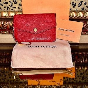 Red Louis VUITTON Monogram Empreinte Key Pouch.